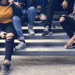 Group of school friends outdoors lifestyle and after school hangout concept